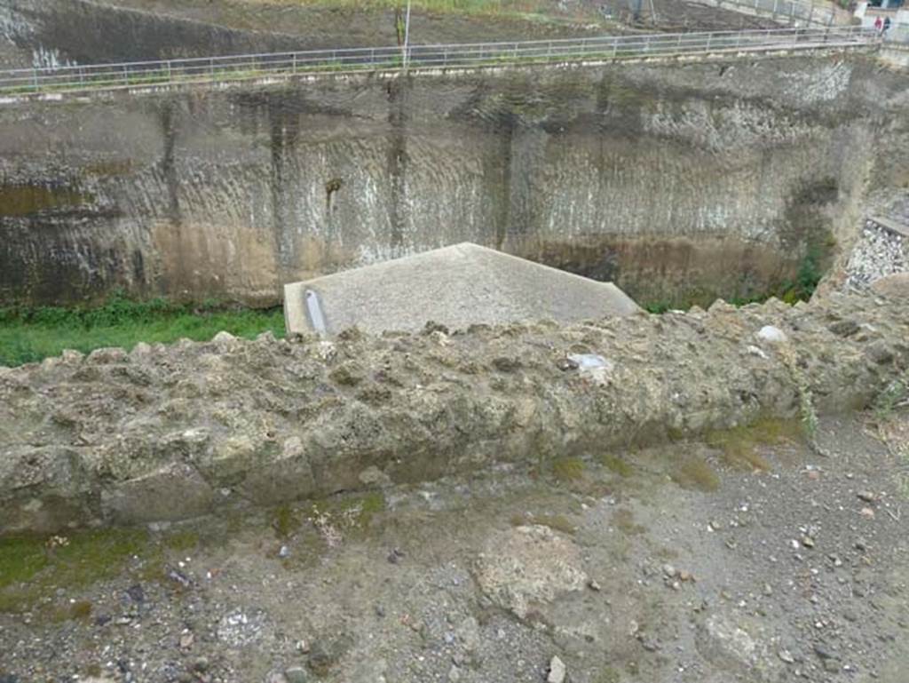 Cardo IV Inferiore, Herculaneum, September 2015. Looking south towards unexcavated, which would have originally been the sea, from top of ramp at end of Cardo IV Inferiore.